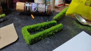 Aplicación de vegetación y césped estático para el detallado de terrenos en miniaturas