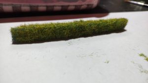 Diorama detallado de una abadía medieval de 27 Dioramas, mostrando arquitectura gótica en miniatura y texturas realistas