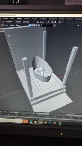 Proceso artesanal del diorama "El Nombre de la Rosa": recreación detallada de los baños del monasterio medieval con Berengario muerto en la bañera, modelado de texturas de piedra húmeda y envejecimiento de mobiliario de madera real